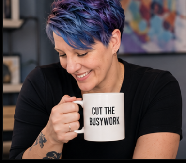 Mickala Anderson holding a mug that says Cut the Busywork